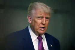 Trump issues new travel ban covering a dozen countries